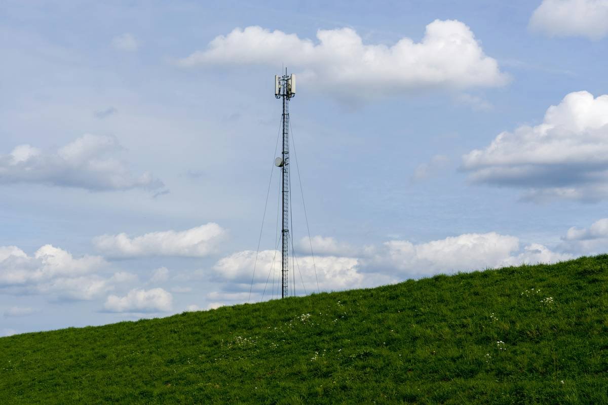 Person installing a wireless smart switch
