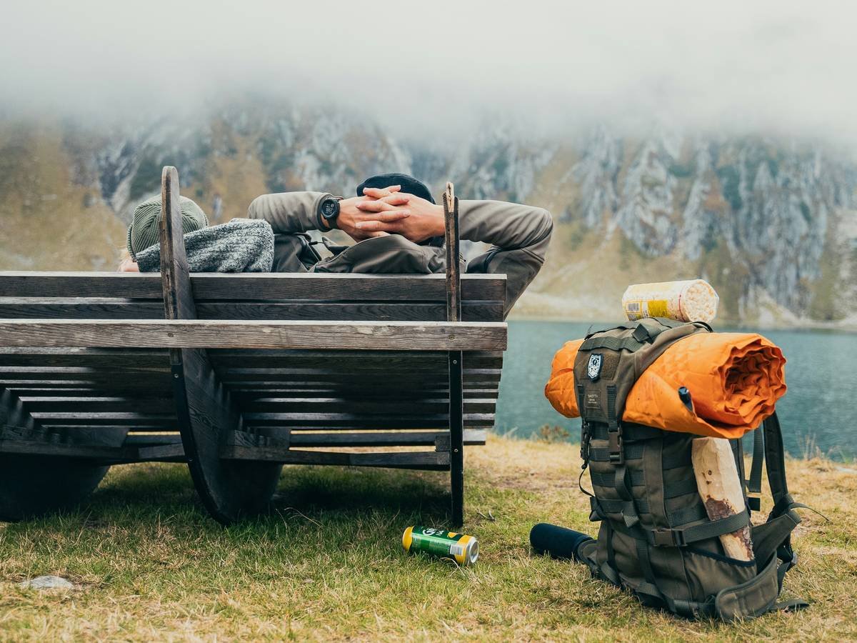Bar chart comparing packed weight and dimensions of top 6 compact travel chairs, showing Helinox Chair Zero vs. competitors